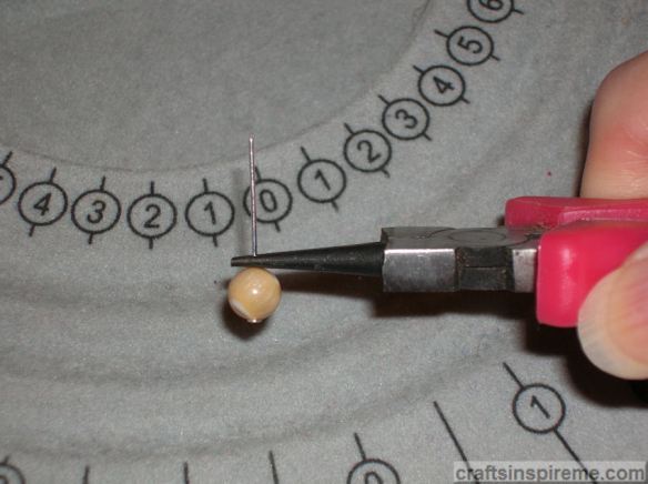 Grasp Head Pin with Pliers